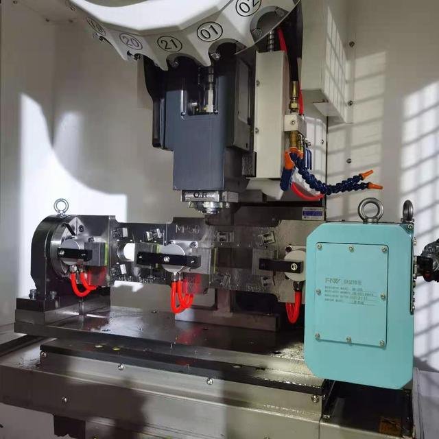 What does a CNC machining center do?